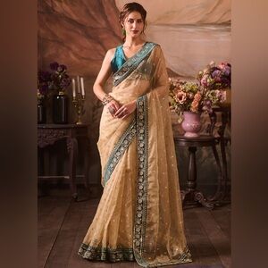 Beige and Blue Embroidered Velvet Saree